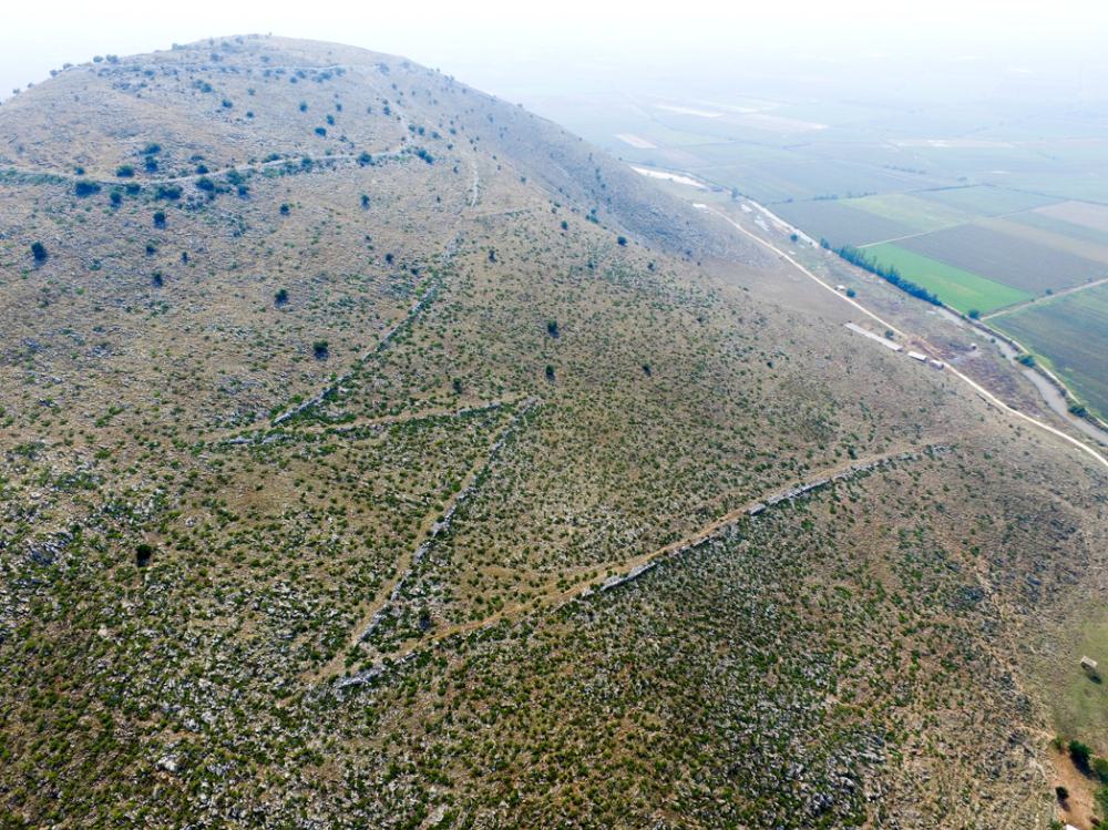 Fig. 3: Serpentine road leading to the hilltop from the plains.